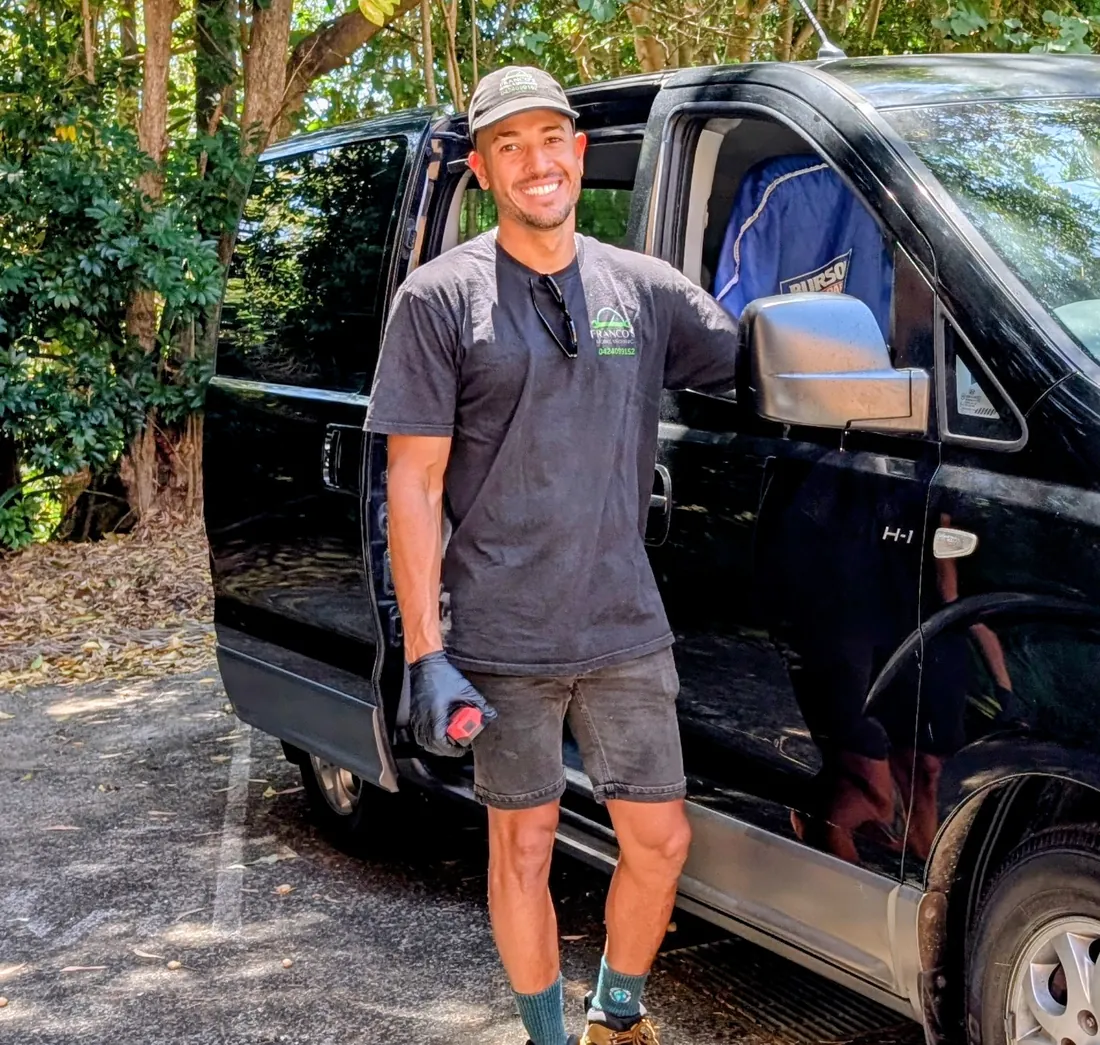 Franco, owner of Franco's Mobile Mechanic, beside his van on the Gold Coast