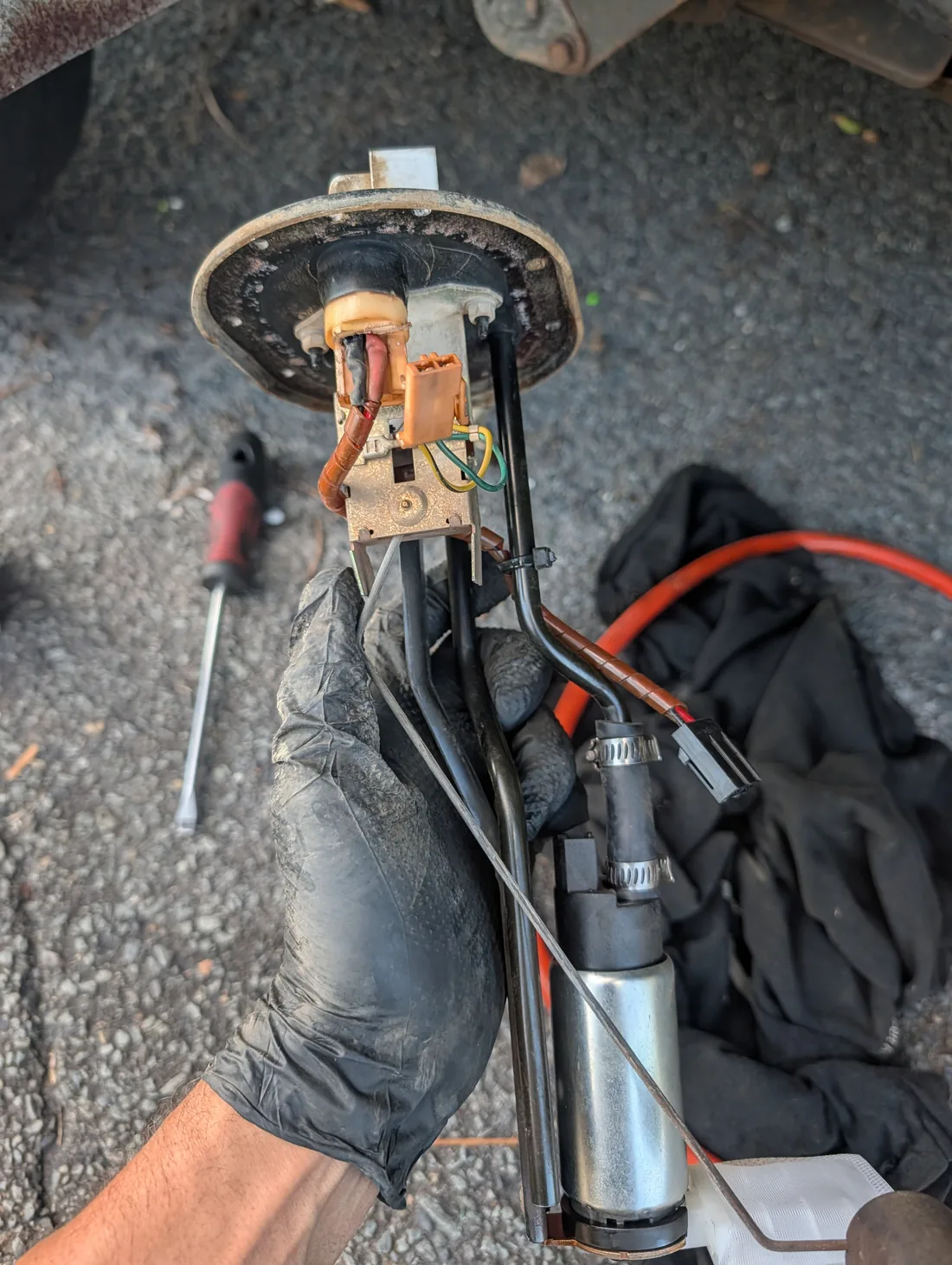 Franco carrying out a mobile car repair at a customer's place on the Gold Coast
